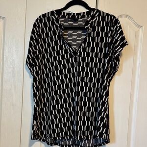 Elegant Black and White Patterned Blouse